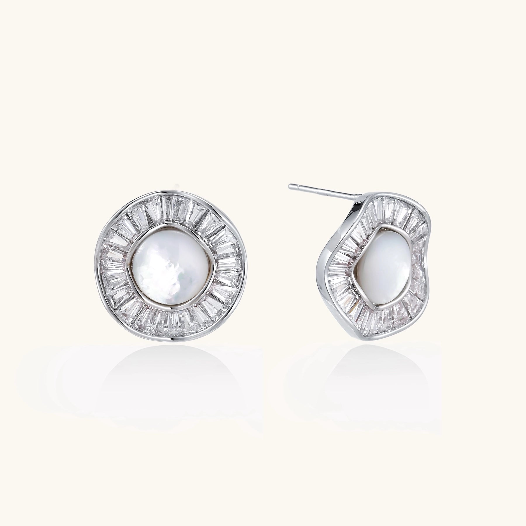 Gold-plated stud earrings with central freshwater pearl surrounded by baguette crystals in radial pattern