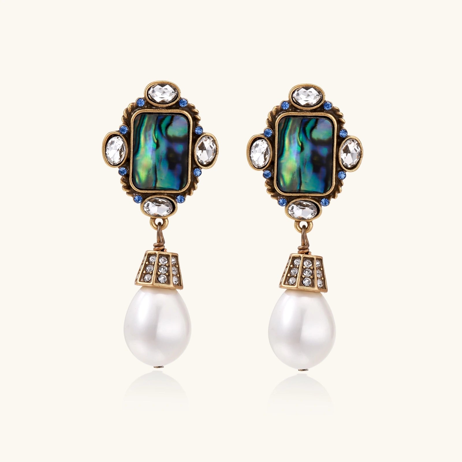 Ornate gold-plated drop earrings with rectangular abalone shell centers, crystal accents, and baroque pearl drops